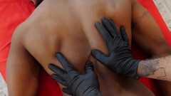 Erotic massage grants this naked ebony man the ultimate sensations