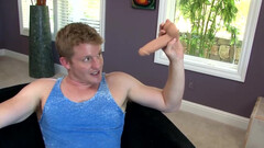 Brunette guy gets a nice blowjob before anal dildo play