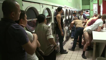 Clothed guys ass fuck the same gay slut in a dirty gangbang in public