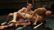 Muscular lovers strip naked to fuck during their wrestling fetish