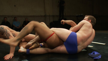 Muscular lovers strip naked to fuck during their wrestling fetish