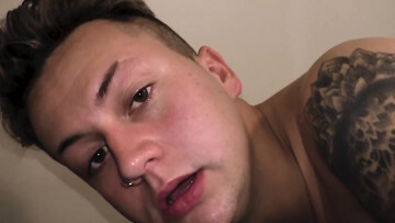 Inked dude showing his oral skills and fingering his ass