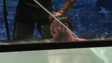 Extreme domination for a submerged slut in leather