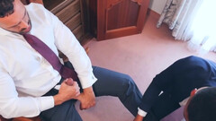 Clothed men fuck in a hotel room until the sperm begins to flow on their lips