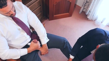 Clothed men fuck in a hotel room until the sperm begins to flow on their lips