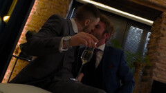 Classy men in suits fuck on the couch until the sperm drops on their shirts