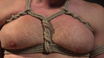 Full cock domination while the male slave sits tied up to the table