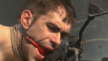 Gagged man sits restrained in roped and endures anal in merciless positions