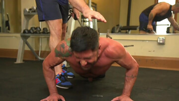 Aroused male slave likes it when his master is putting his hands to work