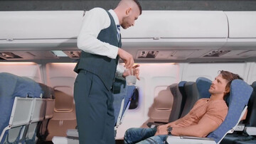 Erotic hard anal sex mid flight between two steamy men