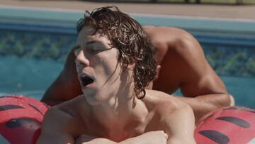 Twink tracing patterns on a hard cock in a swimming pool