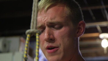 Obedient guy gets fucked with a huge dildo and wanked by his partner