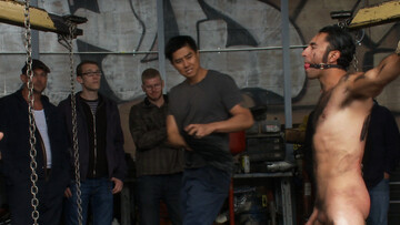 Chained male slave is waiting for his anal punishment