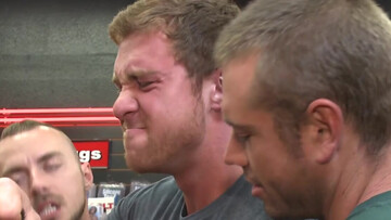 Guy gets power-fucked by big dicks in a public gangbang