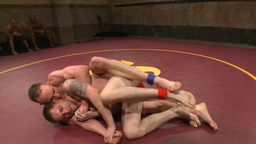 Muscular men wrestle and try ass fucking in a kinky duo