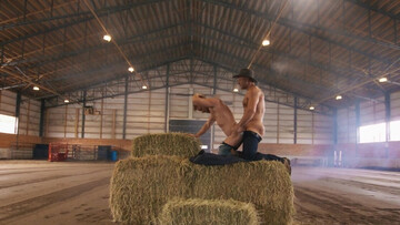 Cowboys with hard dicks are going to fuck in a hangar