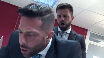 Office hunk taking care of his prey in front of the computer